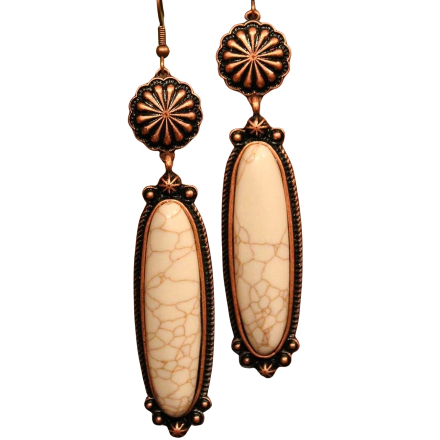 A pair of dangling earrings adorned with beautiful white turquoise