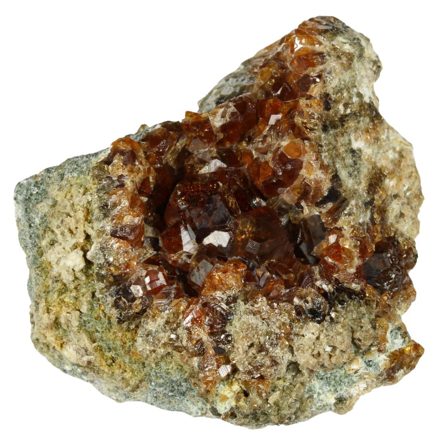 translucent red-orange garnet crystals on a rock