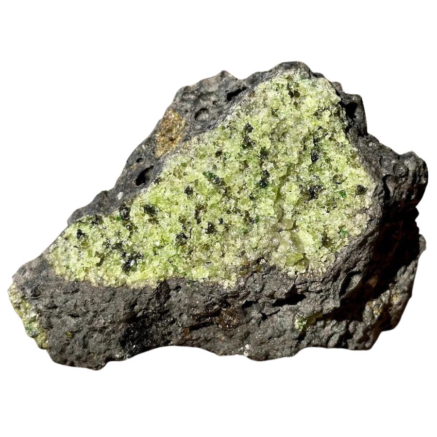 small green olivine crystals on basalt