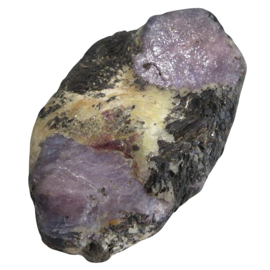 two hexagonal purple sapphire crystals