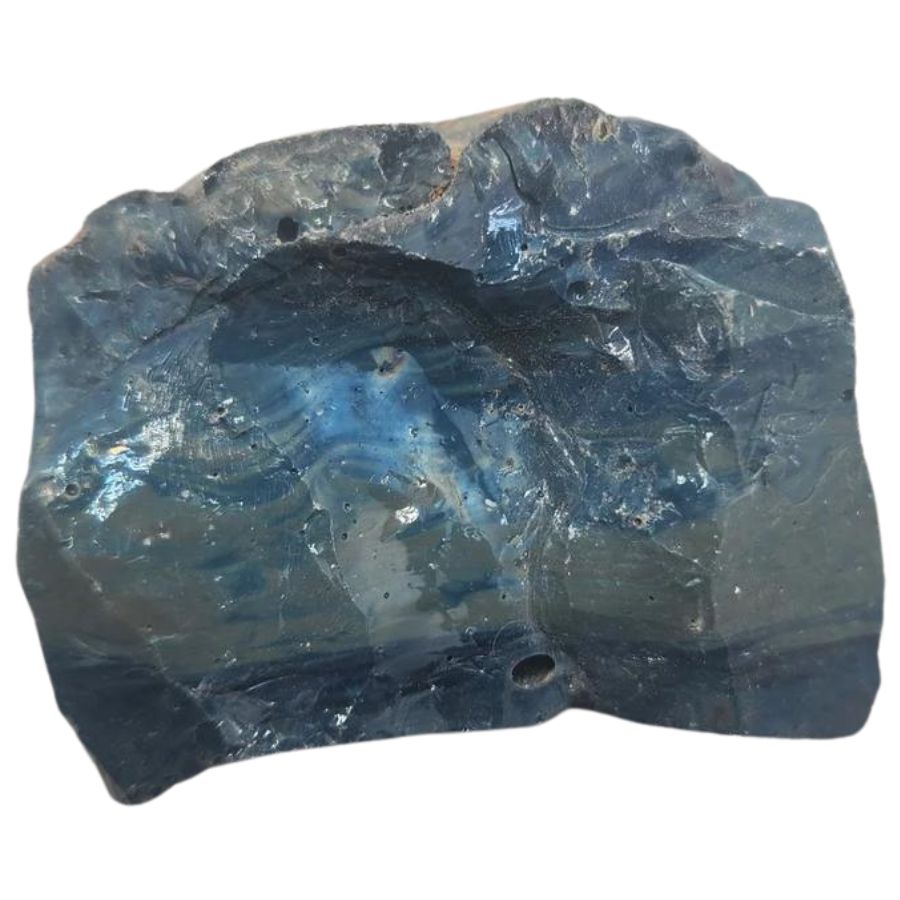 dark blue opaque slag with small bubbles on the surface