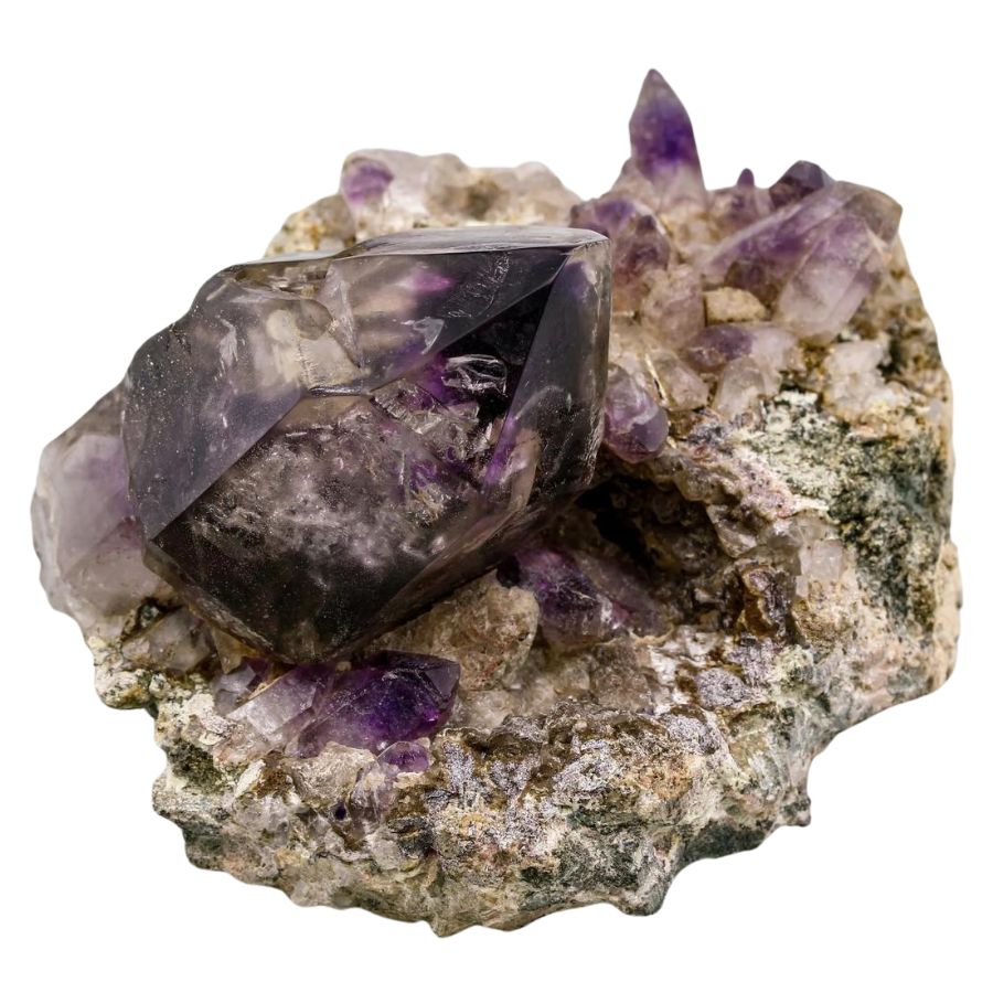 smoky amethyst crystals on a rock