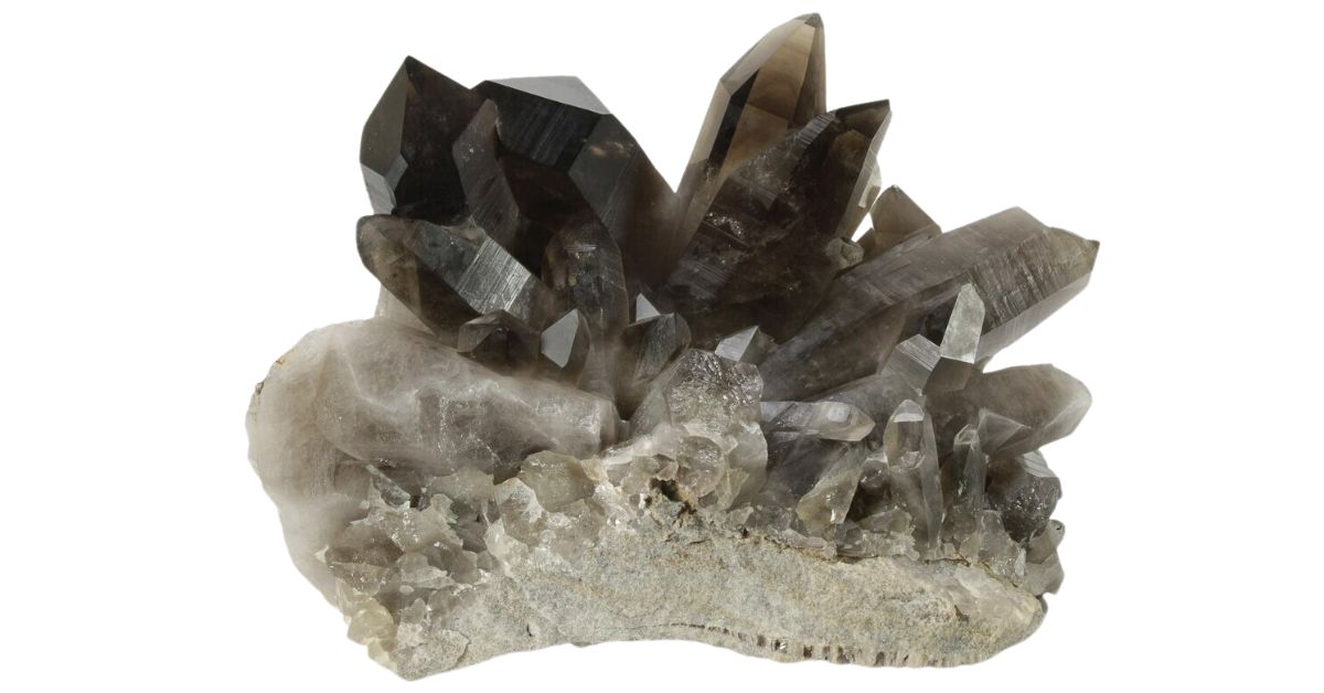 dark brown smoky quartz crystals on a rock