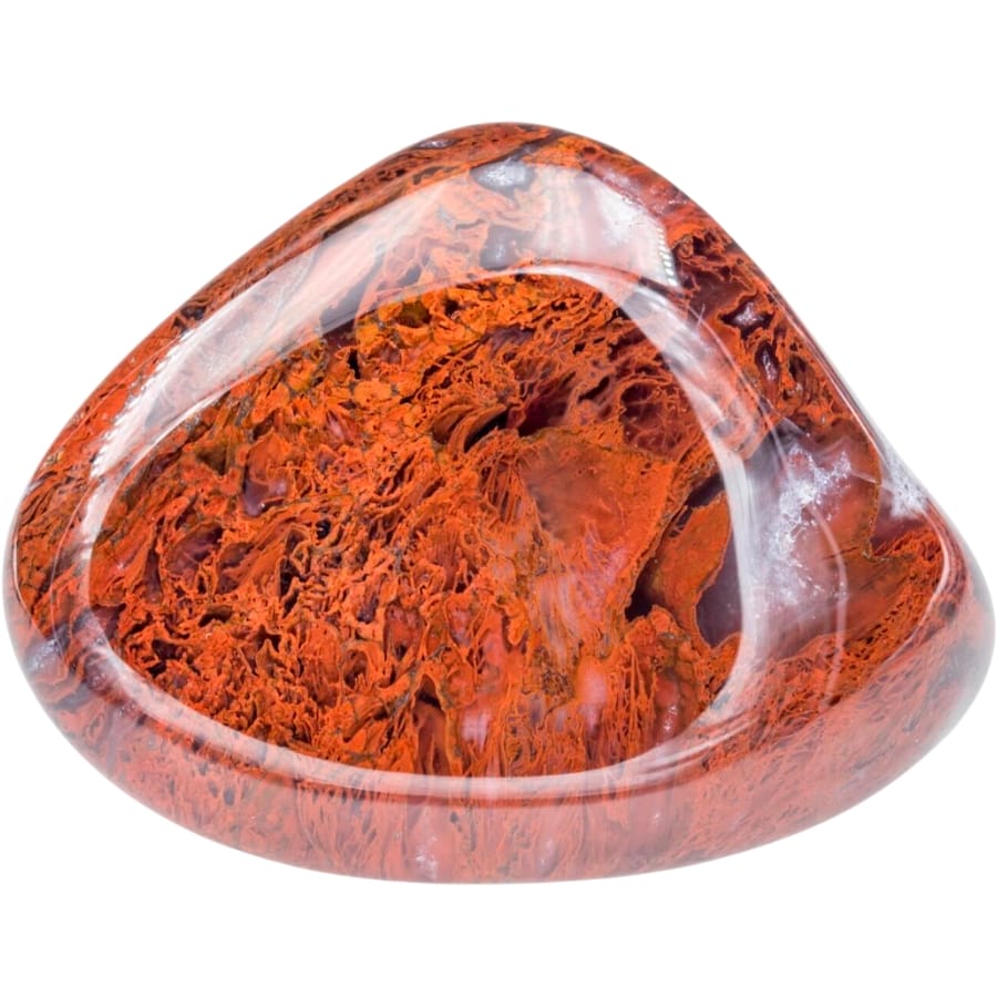 A polished piece of tumbled Mexican moss agate showing deep red-orange inclusions