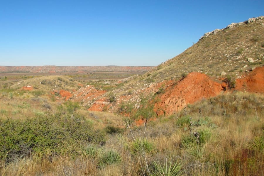 Red hillslopes at the Alibates Flint Quarries National Monument