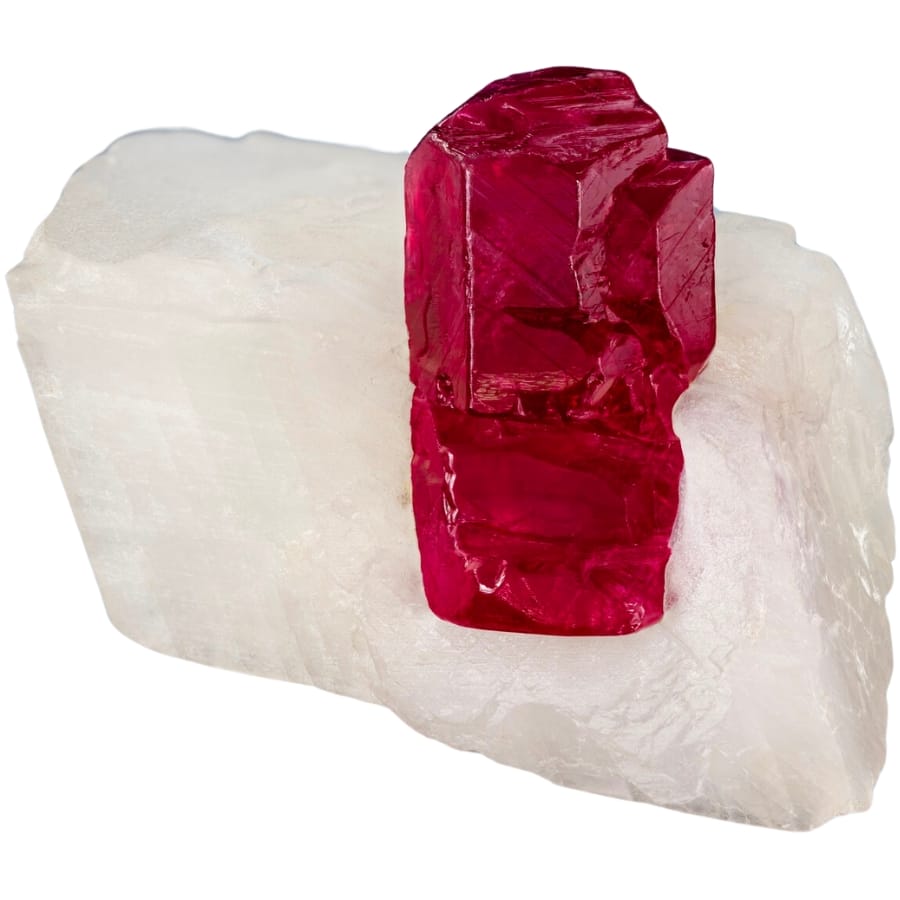 A pigeon blood-red ruby crystal on white marble matrix