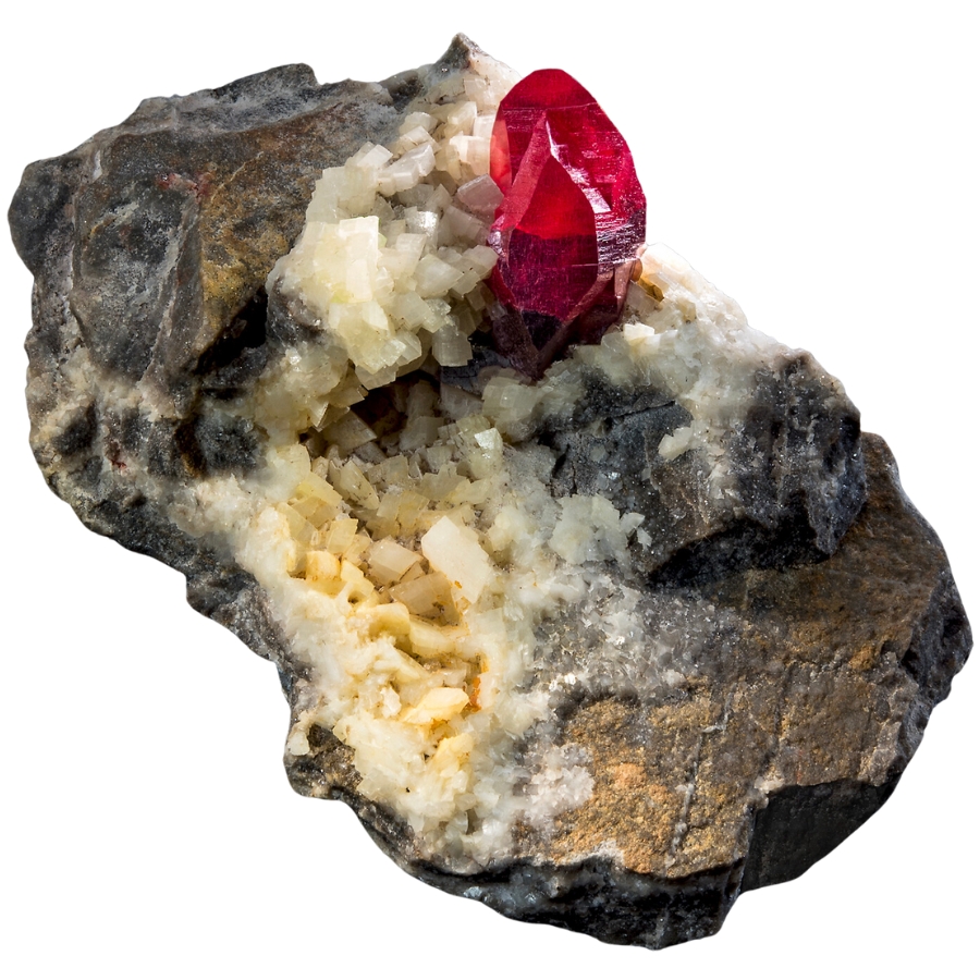 A gemmy, rich red cinnabar crystal perched on a dolomite and rock matrix