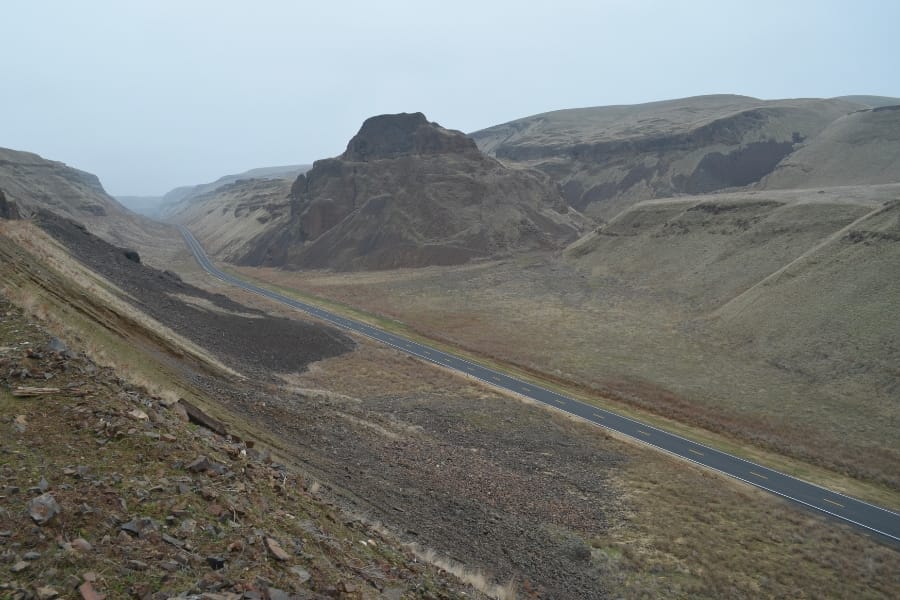 A wide aerial view of Devil's Canyon along the road