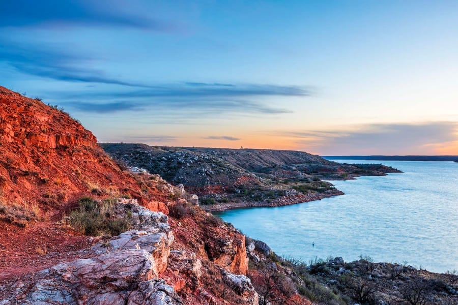 A scenic view of Lake Meredith during sunset