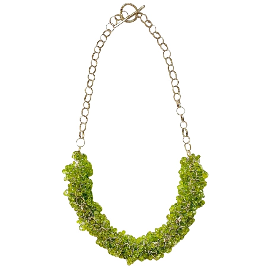 Beautiful pieces of peridot hand-knotted on silver sterling