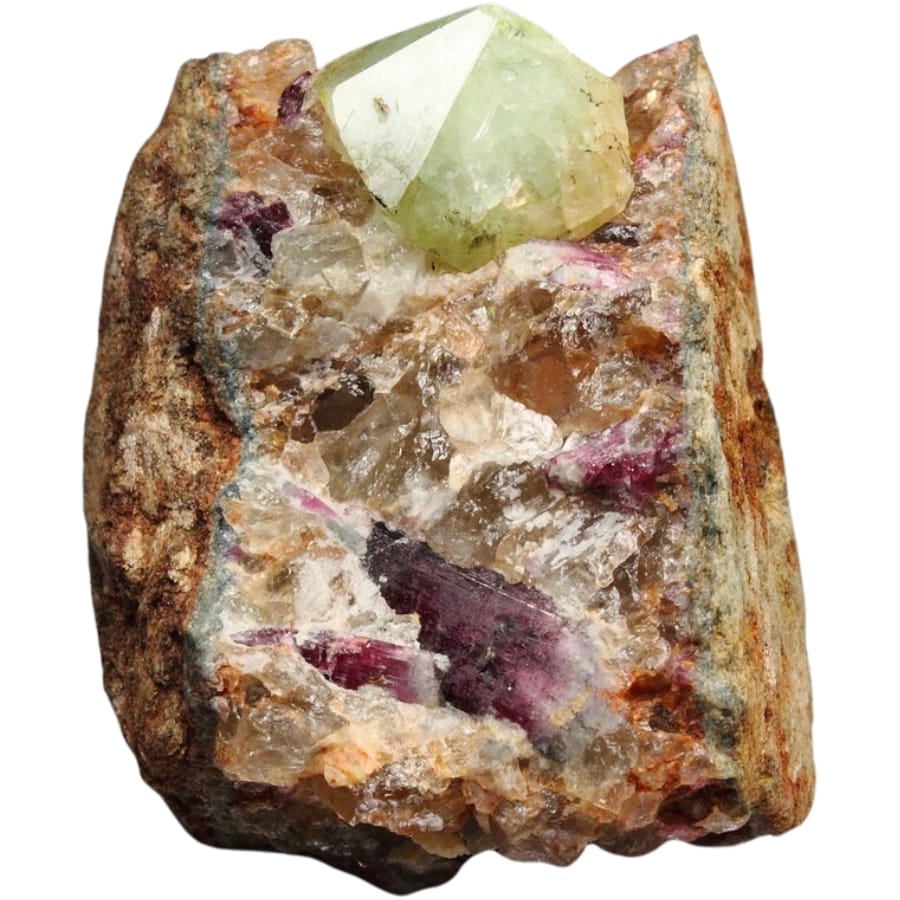 A light green crystal of rhodizite together with rubellite and quartz on a matrix