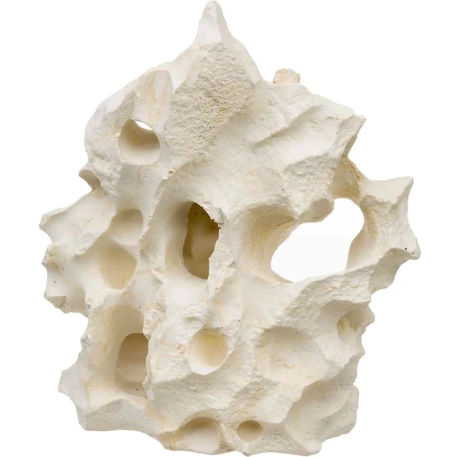 An intricately-shaped white Texas holey rock