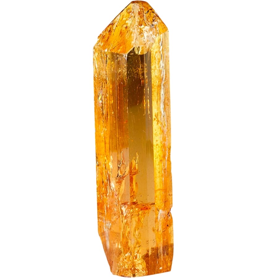 A golden orange Imperial topaz with glassy luster
