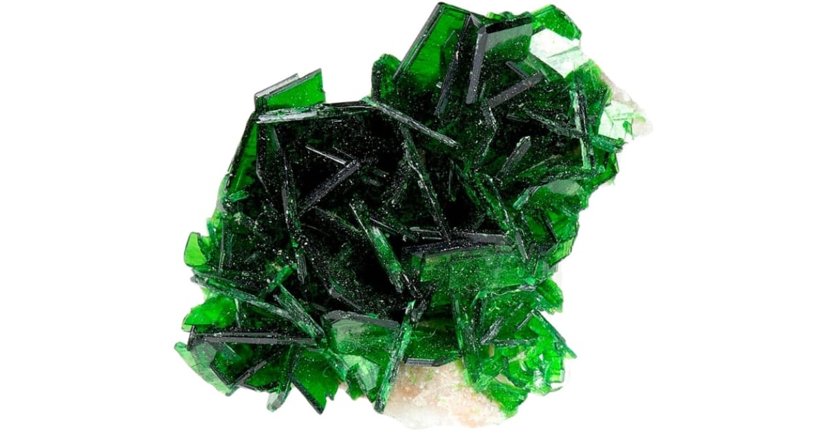 Very thin platy crystals of deep green torbernite set on a small matrix