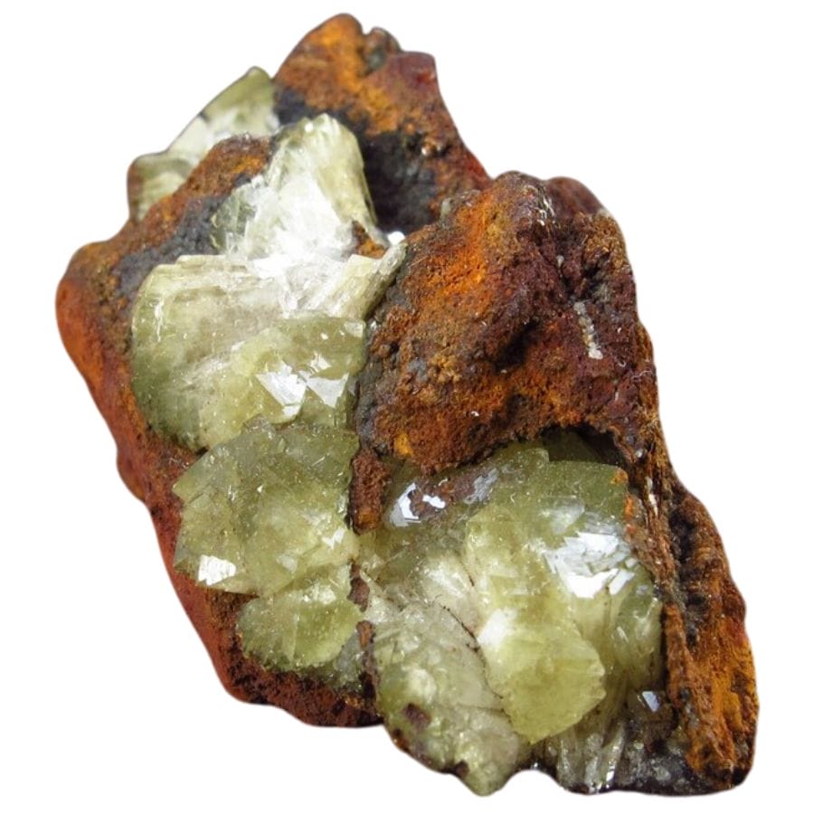 pale green adamite crystals on a rock