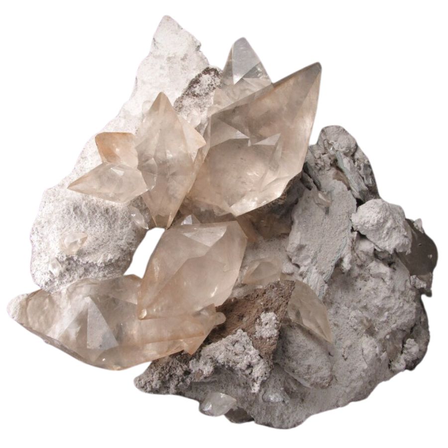 translucent beige calcite crystals on a rock