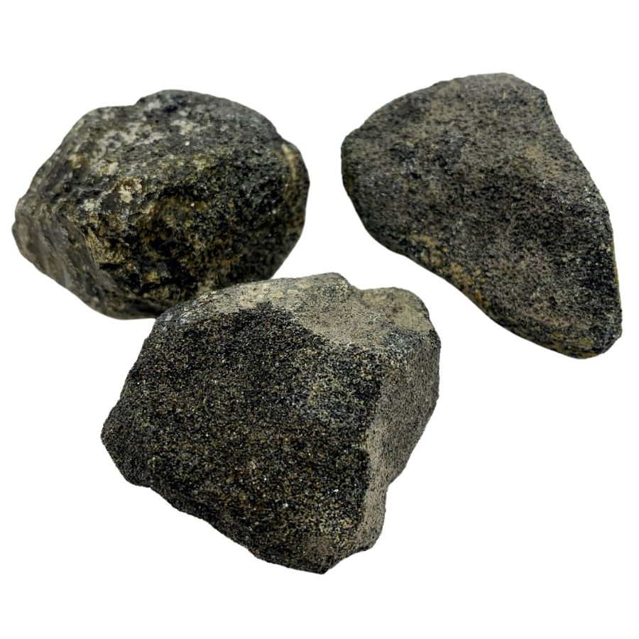 three rough black chromite pieces