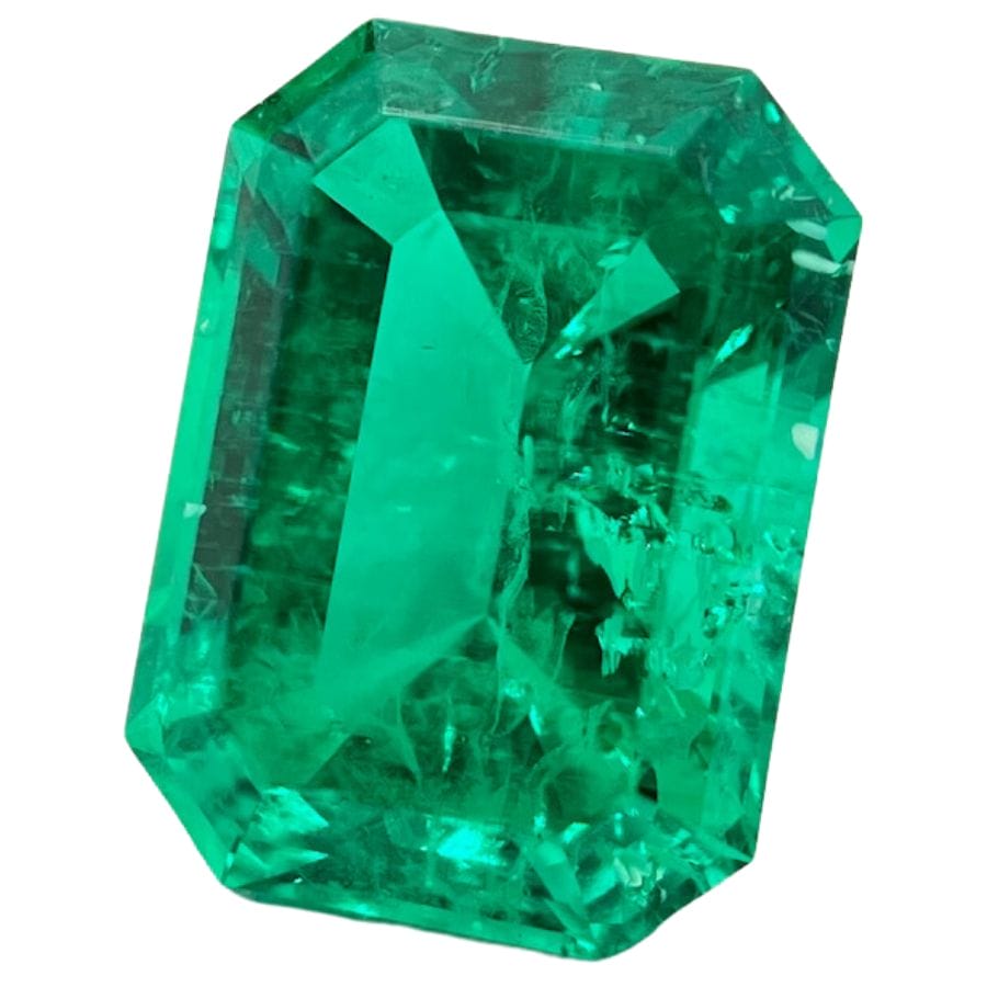 emerald cut translucent Colombian emerald with inclusions