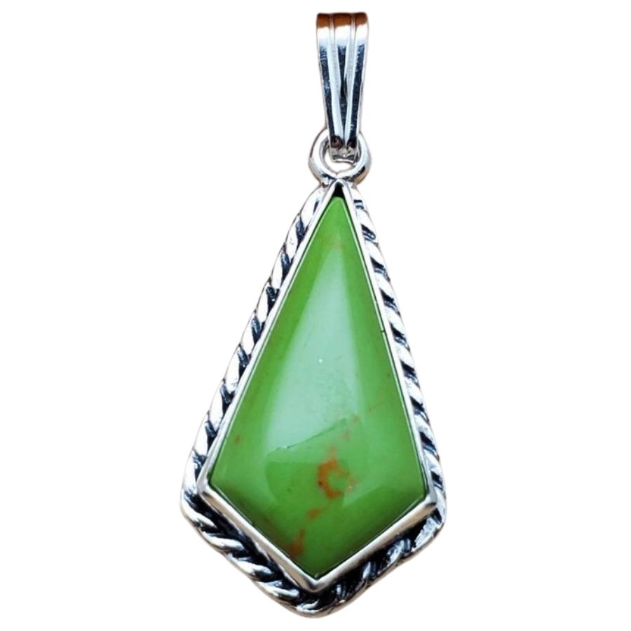 kite-shaped bright green gaspeite cabochon pendant