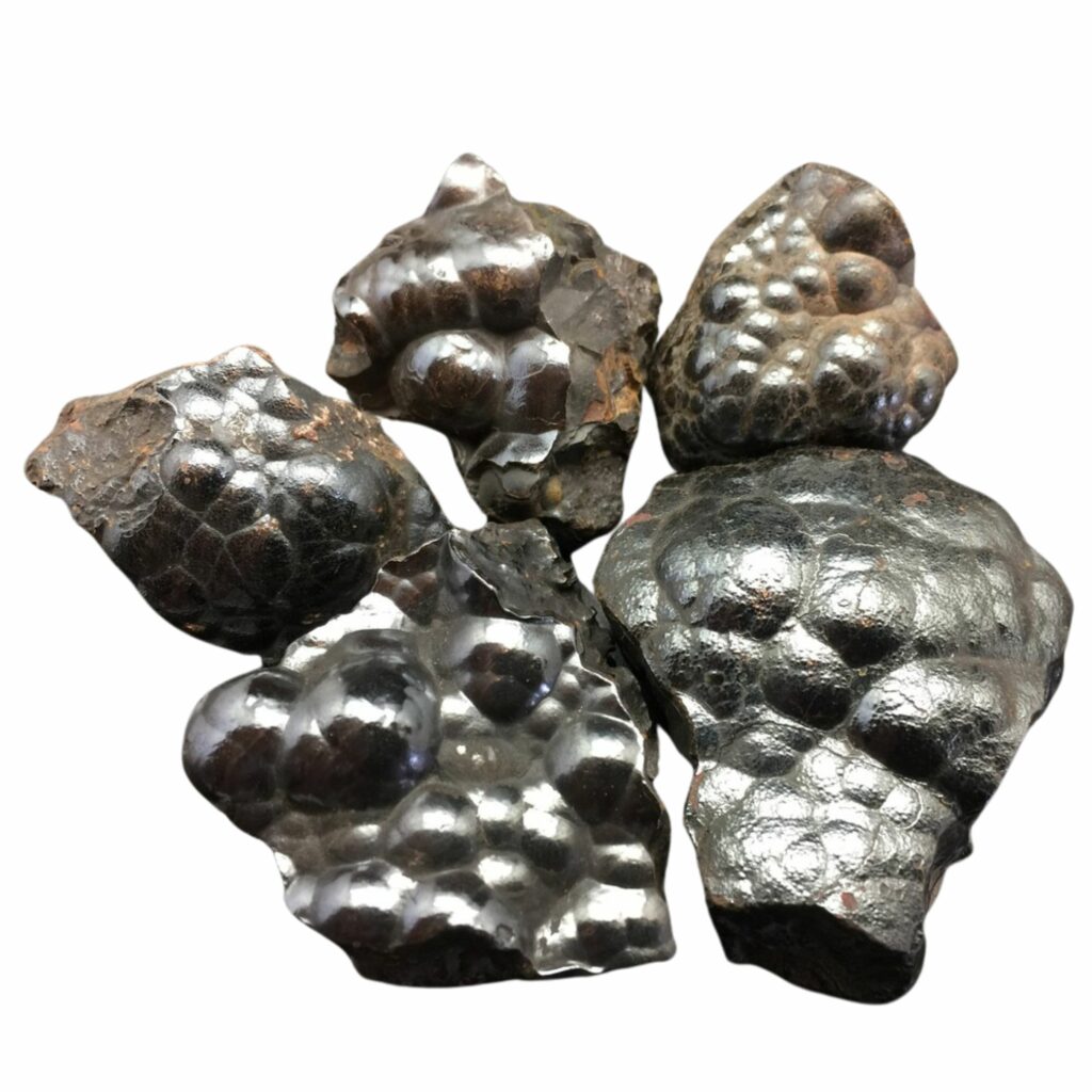 five dark brown botryoidal hematite crystals