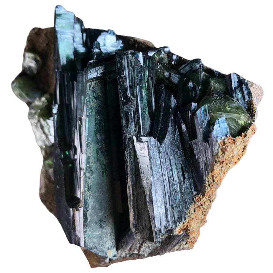 deep green vivianite crystals on a rock