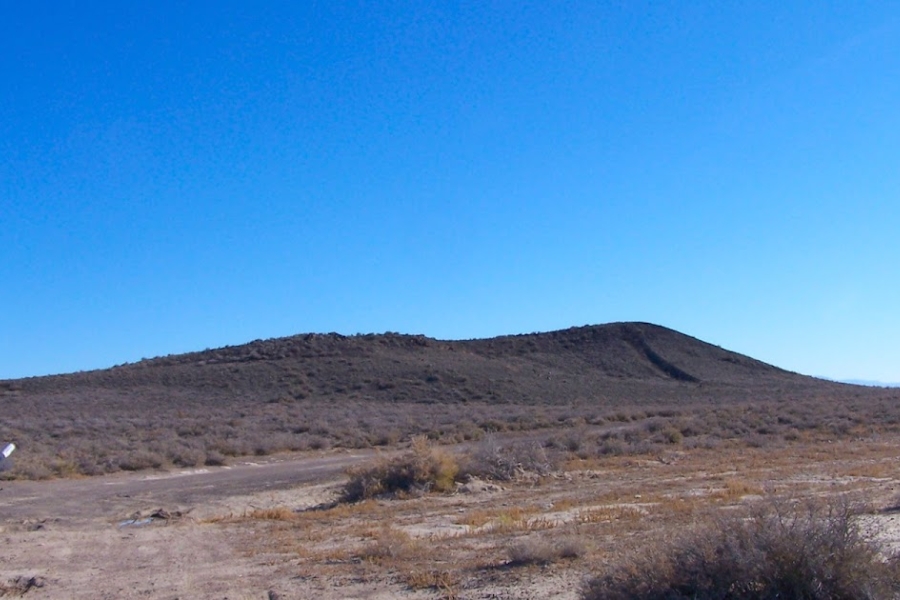 Wide view of Sunstone Knoll under beautiful blue skies