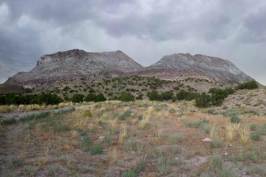 Wide view of the Topaz Mountain foregrounded with a wide area of land