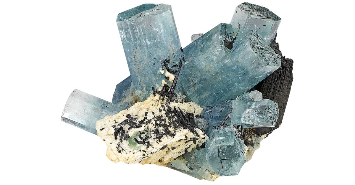 several blue aquamarine crystals clustered together