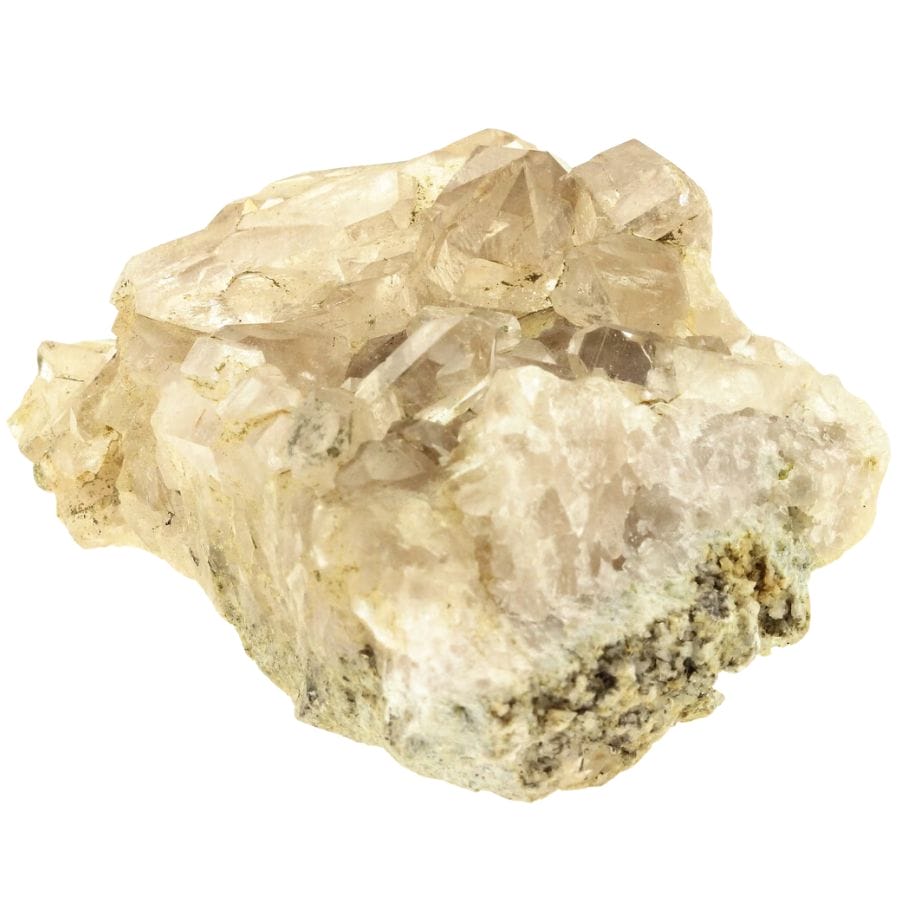 clear quartz crystal cluster on a rock