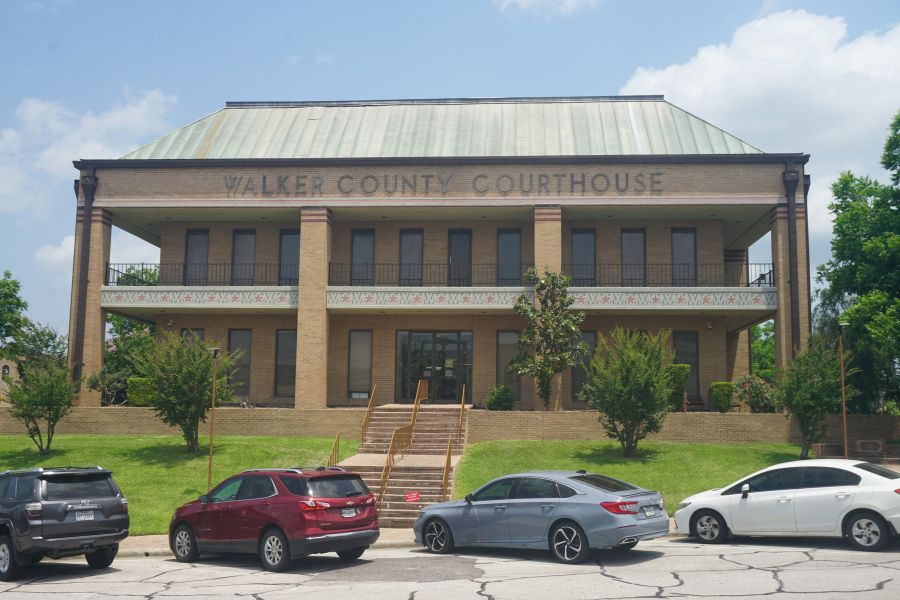 two story building with parking lot