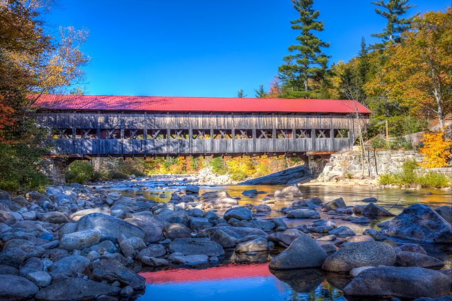 covered bridge across a river