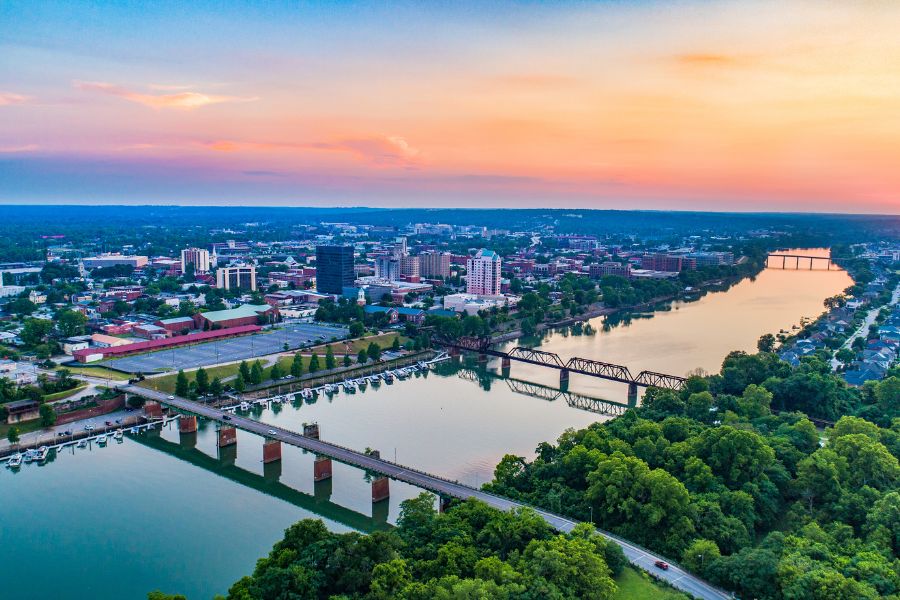 aerial view of a wide river with bridges