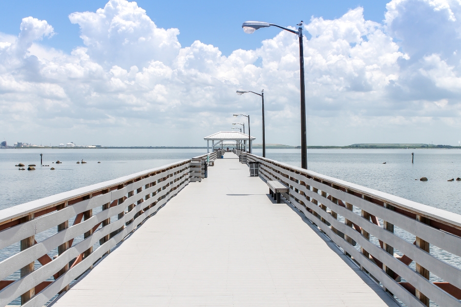 wooden pier overlooking an ocean