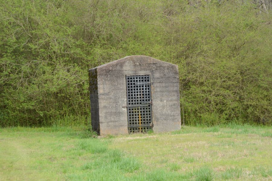 old jail cell in a field