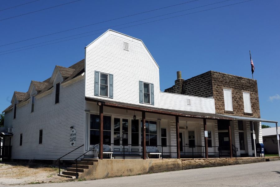 white building with a porch