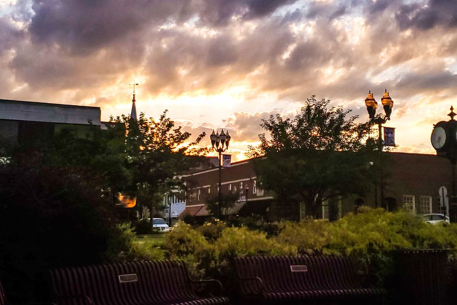 view of buildings against the sunset