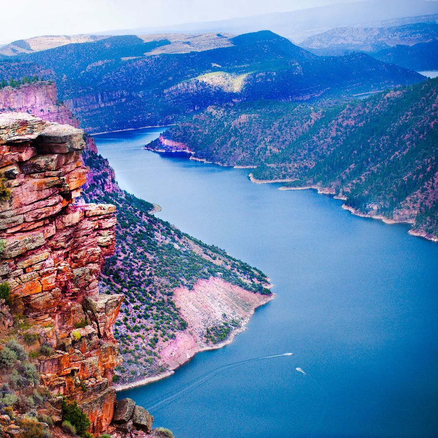 aerial view of a wide river and cliffs