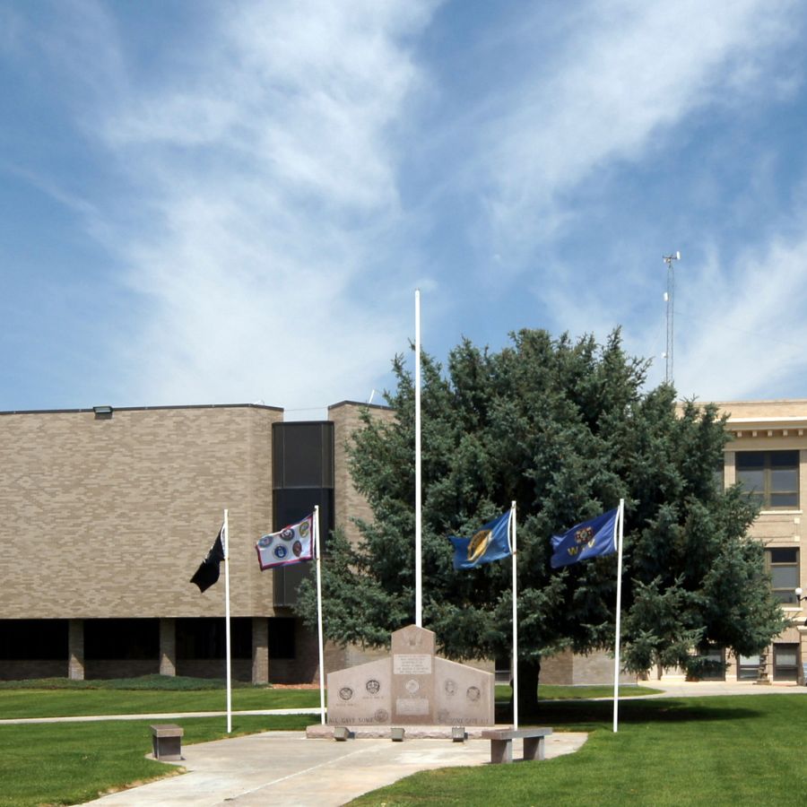 flag poles in a town square