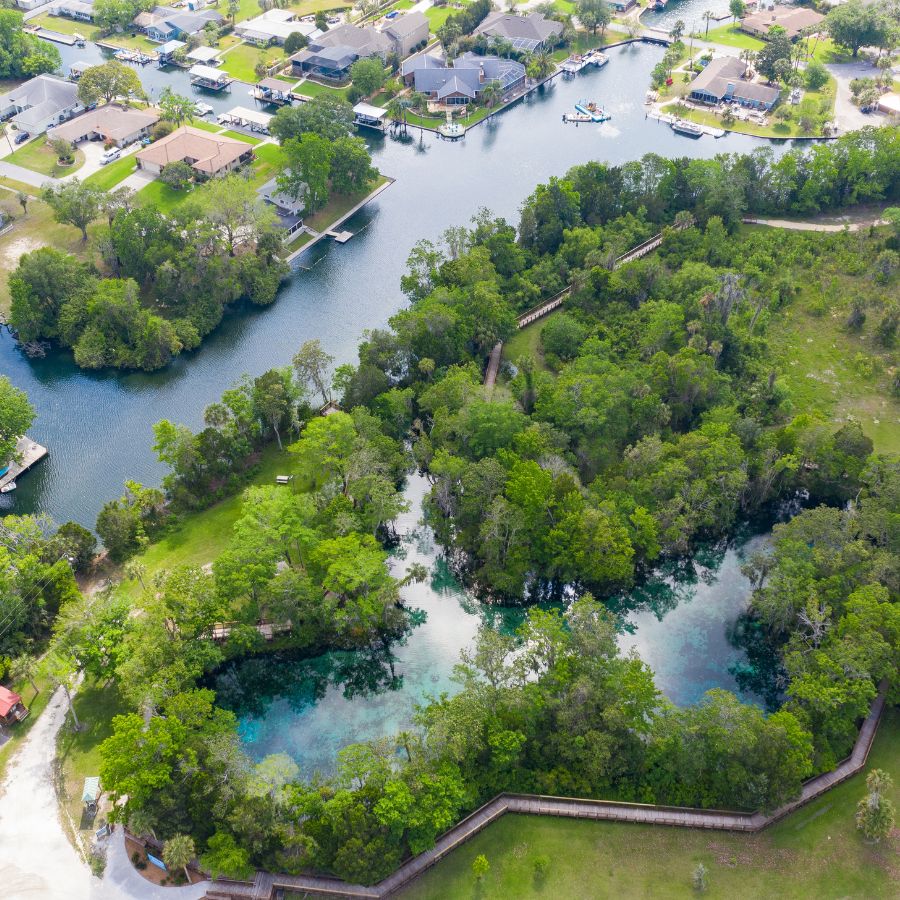 aerial view of a neighborhood along a river