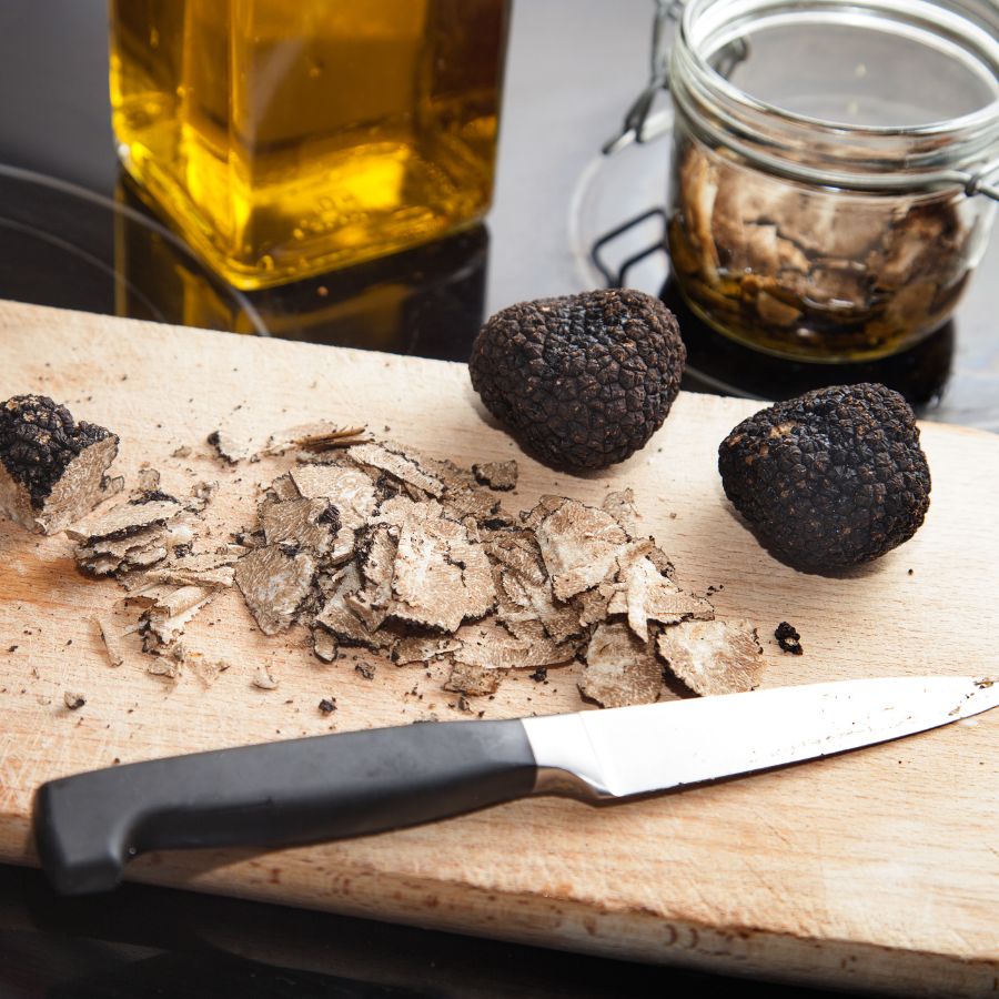 truffles sliced up on a cutting board