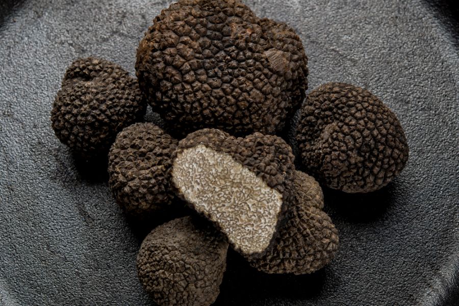 Sliced black truffle cluster